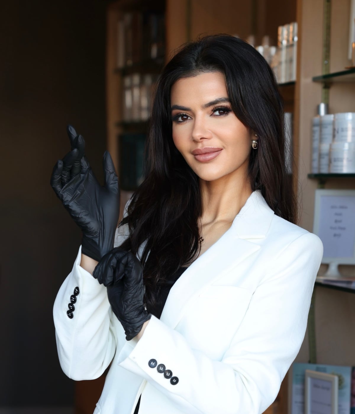 Muna Aboabdo, RN, BSN, founder of My Youth Aesthetics Med Spa in Orange, California, in a white blazer