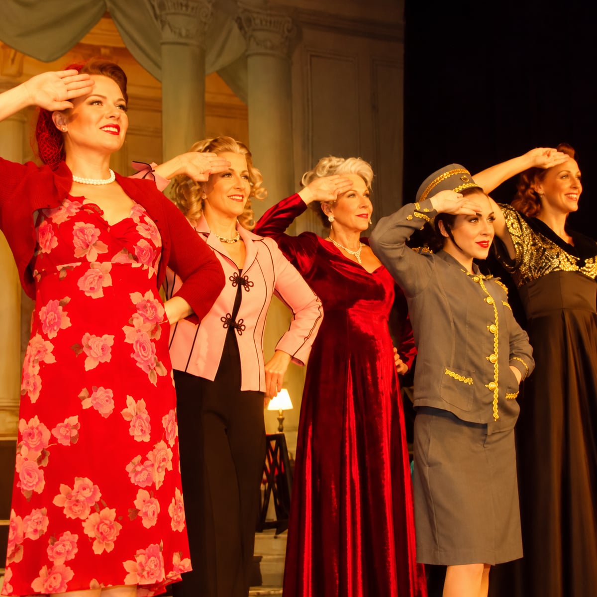 Cast of The Liberty Belles performing onstage in 1940s-inspired costumes.