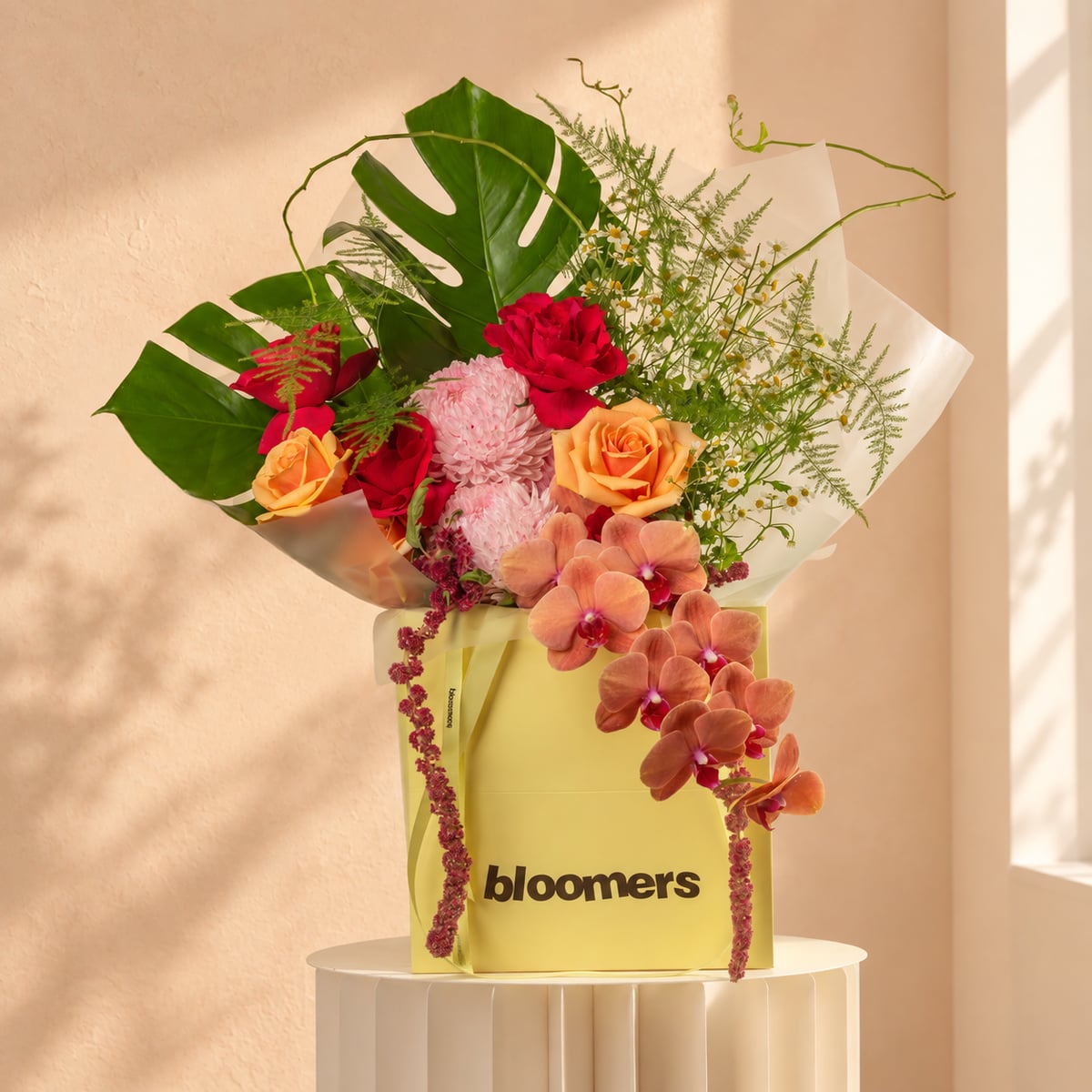 Bloomers signature yellow bag with a beautiful summer bouquet